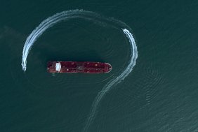 Speedboats from Iran's Revolutionary Guard circle the British-flagged oil tanker Stena Impero on Sunday, July 21, 2019 in the Iranian port of Bandar Abbas, after it was seized in the Strait of Hormuz two days earlier
