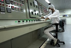 An Iranian technician works at the Uranium Conversion Facility just outside the city of Isfahan/Iran